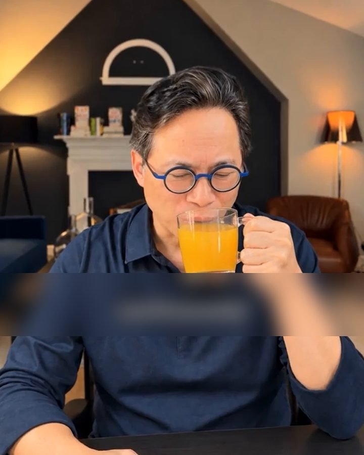 Dr. Li drinking his morning olive oil drink
